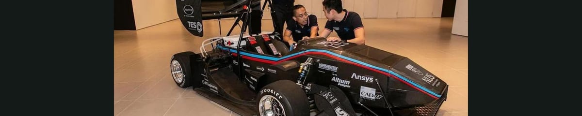 NUS students with electric race car