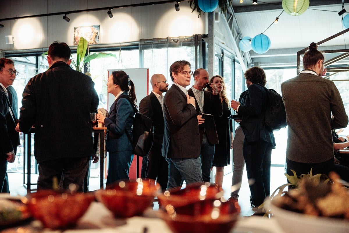 Guests enjoy food and drinks at opening ceremony